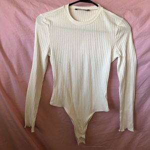 White long sleeve turtleneck bodysuit